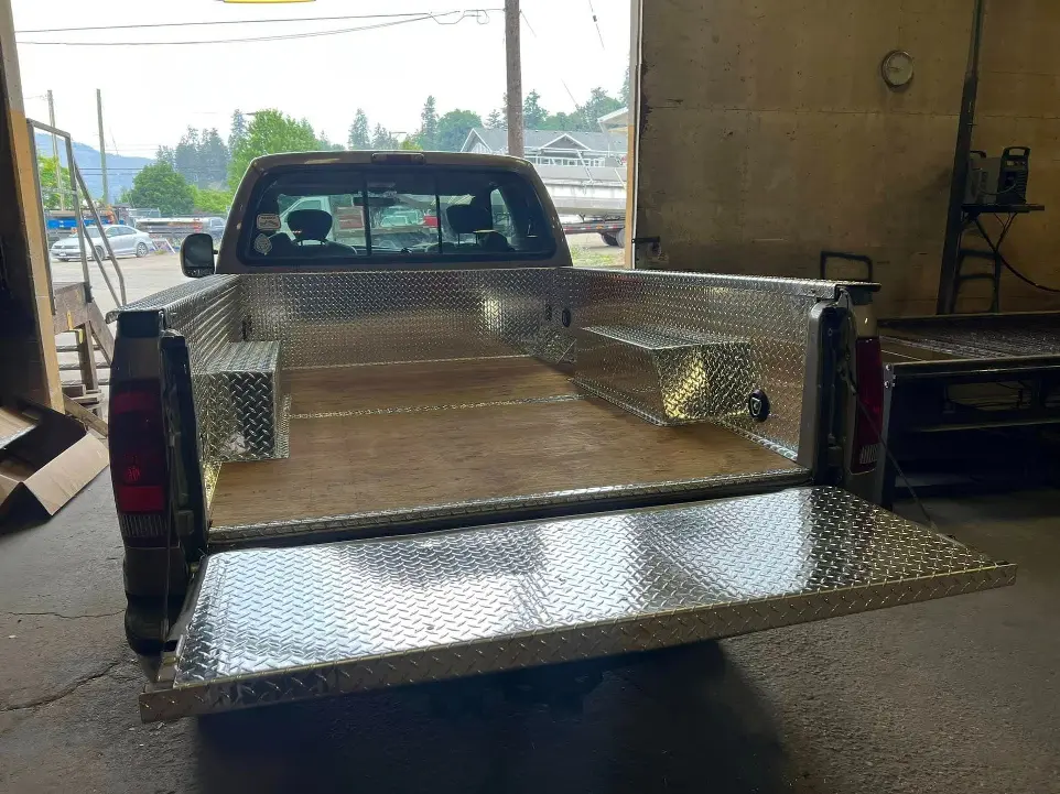 Checkerplate aluminum box liner and tailgate cover